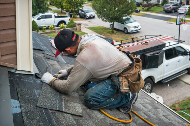 Professional Roofing technician working in Goodland, IN